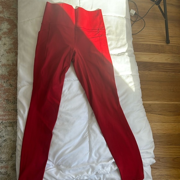 Athleta Salutation Stash Tight With Pockets - Picture 2 of 5